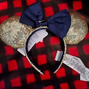 Yellow sequin ears with blue bow